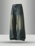 Faded Blue Wide-Leg Jeans With Whiskered Wash